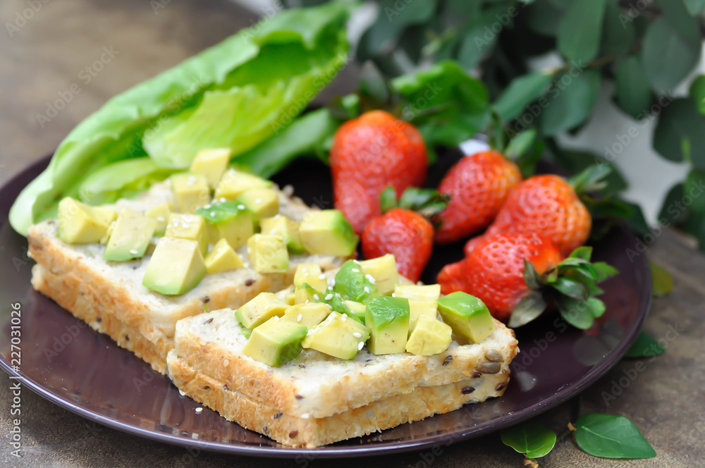 bread with avocado and strawberry