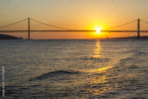 Bridge over water at sunset © raquel