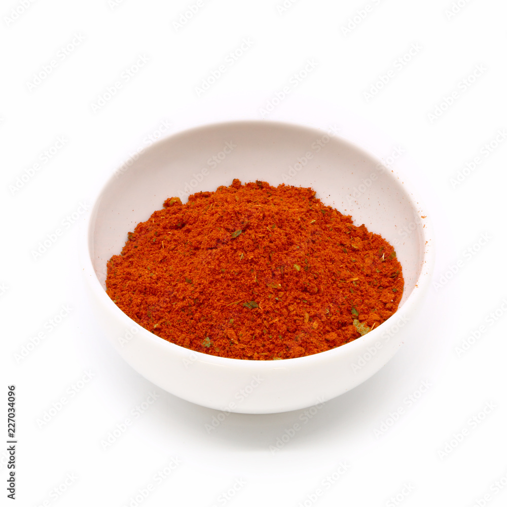 spices for meat and fish in a white ceramic cup, isolated spices for meat and fish in a white ceramic cup, isolated