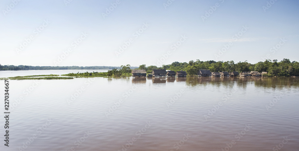 Amazonas landscape. Typical indian tribes settlement in Amazon. Amazonas landscape. Typical indian tribes settlement in Amazon.