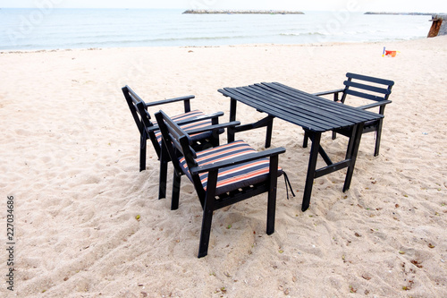 Dining table and chairs on the beach