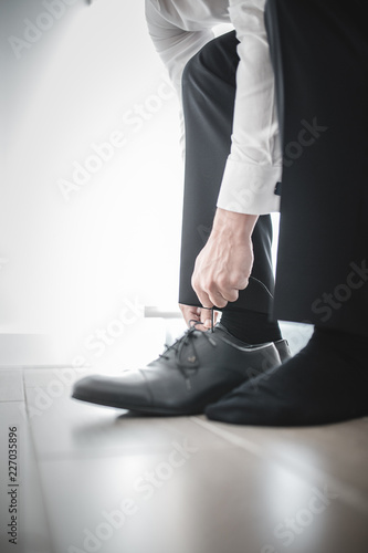 man in suit and shoes