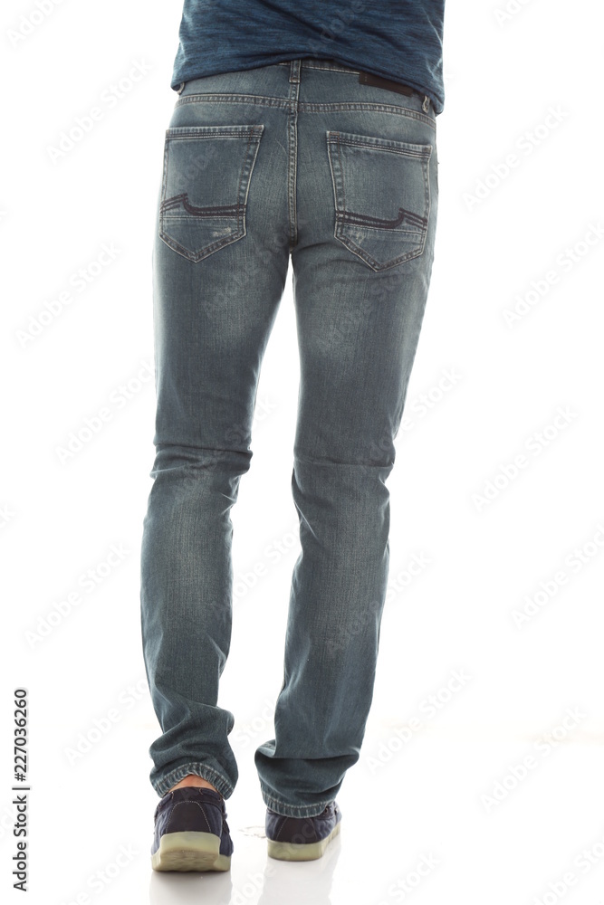 man legs and blue denim on white background man legs and blue denim on white background