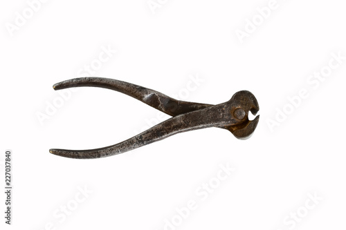 Old rusty wire cutters, steel, isolated on white background