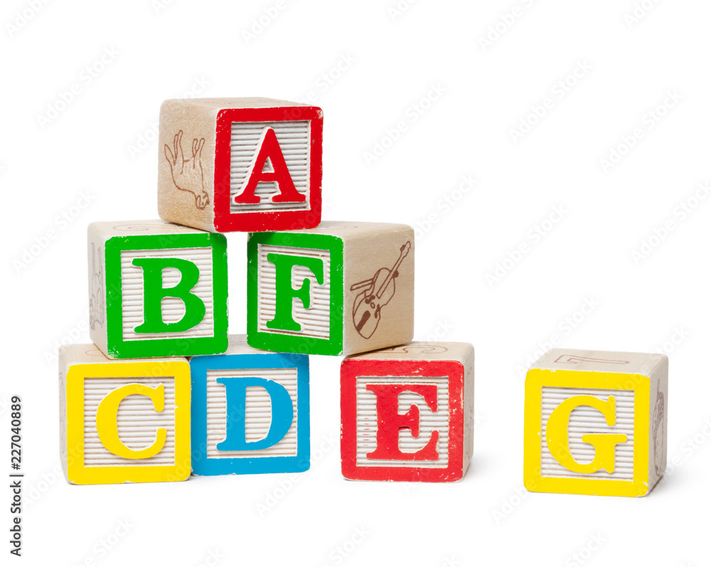 Wooden alphabet blocks isolated on white background Wooden alphabet blocks isolated on white background