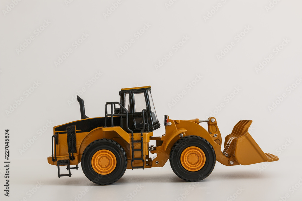 Fototapeta premium Wheel loader model on white background