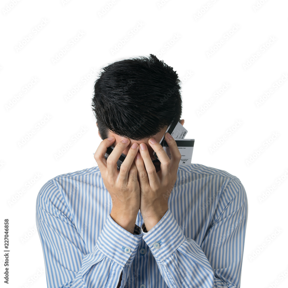Portrait handsome young asian man wearing a blue shirt holding credit card and stressful isolated on white background. Asian man people. business success concept. Portrait handsome young asian man wearing a blue shirt holding credit card and stressful isolated on white background. Asian man people. business success concept.