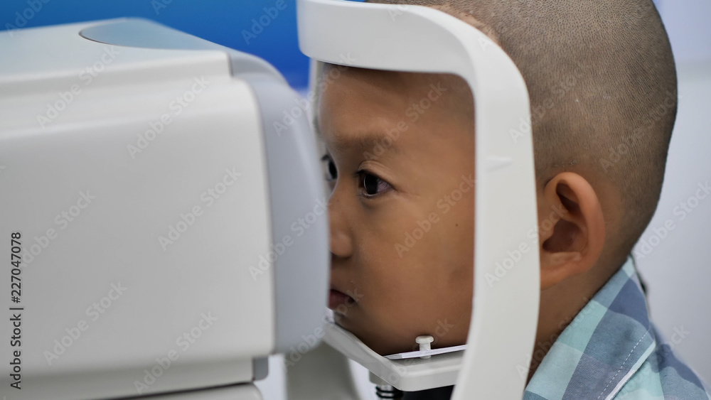 eyesight check. Asian boys who have vision disabilities. Left eye is not visible from brain surgery. Medical treatment and Rehabilitation.. eyesight check. Asian boys who have vision disabilities. Left eye is not visible from brain surgery. Medical treatment and Rehabilitation..