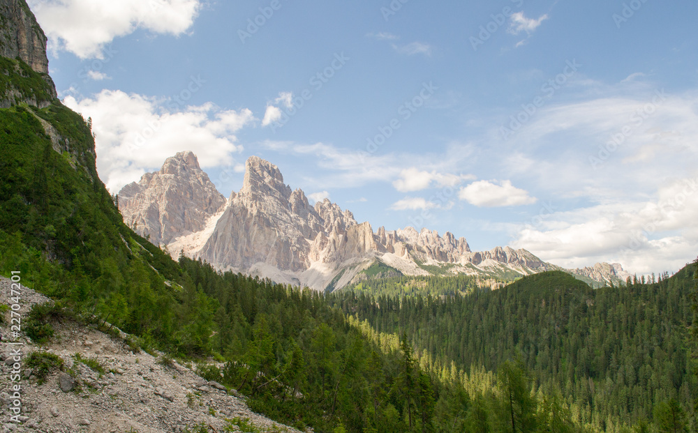 Landscape view from an excursion trail in the Dolomites mountains. This mountain range is part of the Italian Alps and is a really unique sight because of the particular kind of stone it is made of