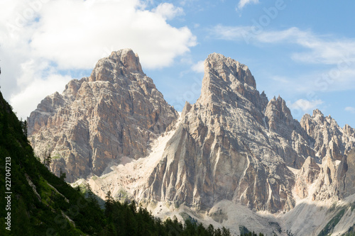 Landscape view from an excursion trail in the Dolomites mountains. This mountain range is part of the Italian Alps and is a really unique sight because of the particular kind of stone it is made of