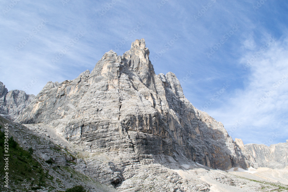 The majestic Sorapiss peak in the italian Alps range, in particoular in the Dolomites. It is one of the highest in this group of mountains around 3000mt on the sea level The majestic Sorapiss peak in the italian Alps range, in particoular in the Dolomites. It is one of the highest in this group of mountains around 3000mt on the sea level