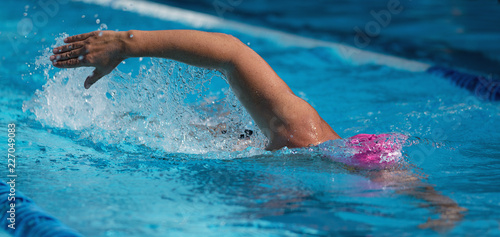 Swimmer athlete swim crawl stroke in pool track