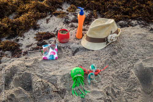 objetos sobre la arena en la playa photo