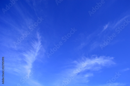 Blue sky with beautiful textural clouds.