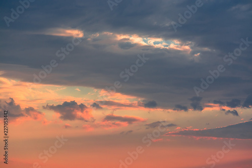 Colorful clouds on dramatic sunset sky © automatic9751