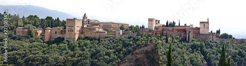 Panorama view of the historic Alhambra Palaces and Generalife Gardens in Granada, Spain.