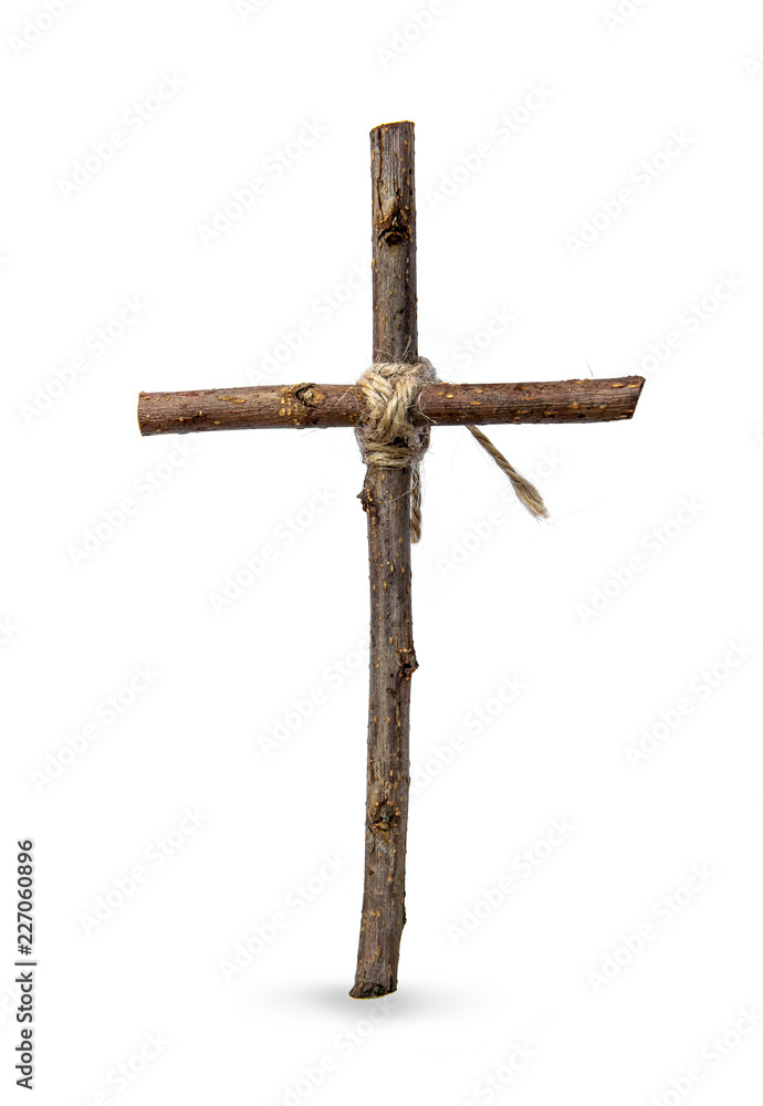 The cross is made of old wood and has a rope tied at the core. isolated ...