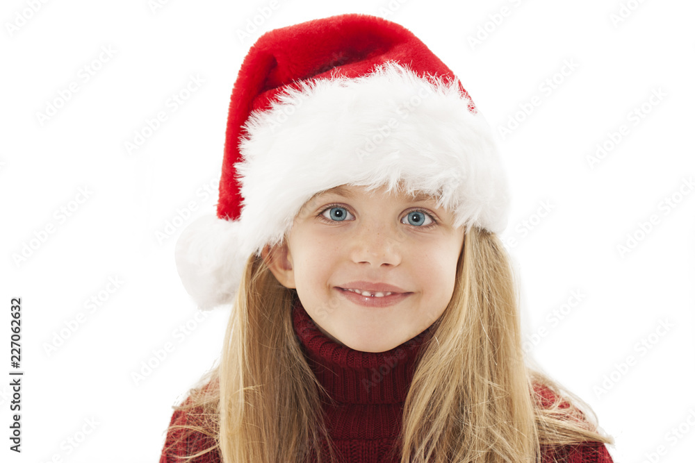 Adorable little girl in red Santa hat. Isolated on white background Adorable little girl in red Santa hat. Isolated on white background
