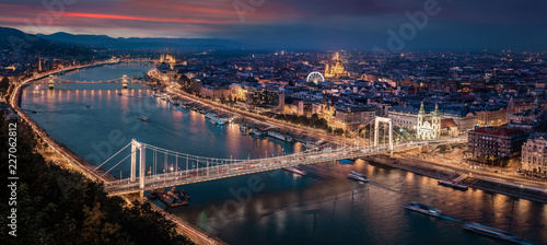 Budapest, Hungary - Aerial panoramic skyline of Budapest at sunset. This view includes Elisabeth Bridge (Erzsebet Hid), Parliament, Szechenyi Chain Bridge, St. Stephen's Basilica and other landmarks © zgphotography