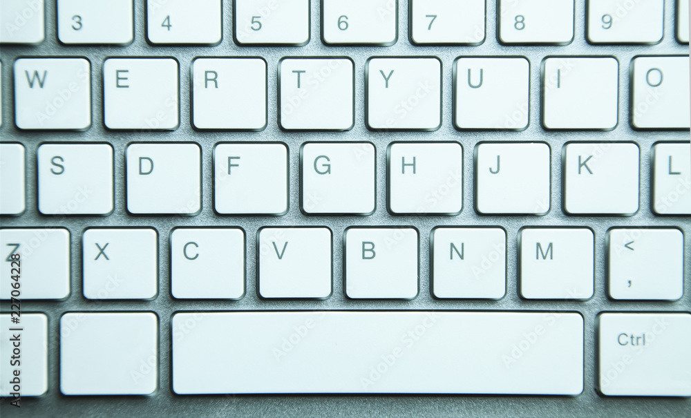 White modern computer keyboard background. White modern computer keyboard background.