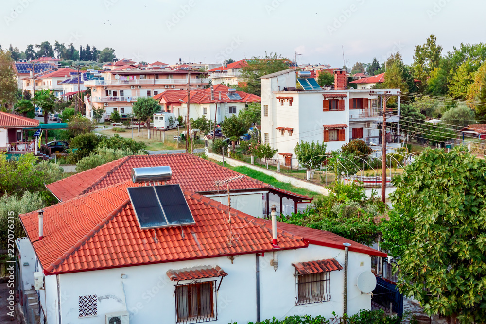 Solar panel, water heater on house roof, green energy
