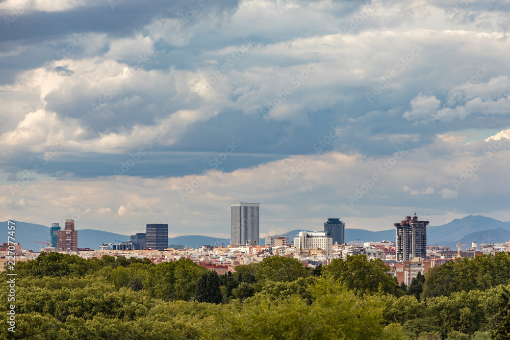Skyline of Madrid with the four towers in the background and the cemetery of Almudena in the foreground