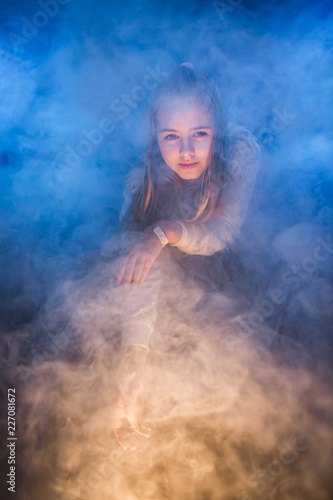 Portrait of a girl in the smoke