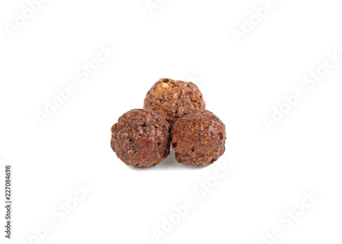 chocolate corn balls in on a white background
