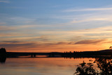 Sunset in the North, midnight sun over the river in Rovaniemi, Finland