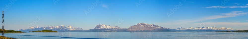 Panorama of snowed mountain in Lofotens islands, Norway.