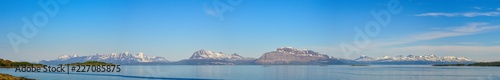 Panorama of snowed mountain in Lofotens islands, Norway.