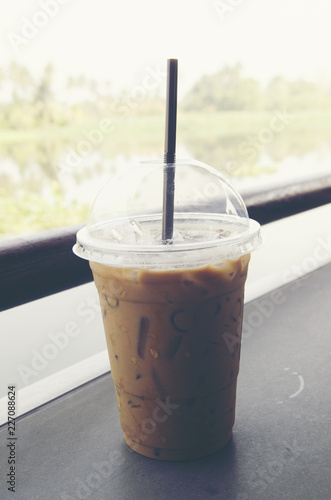 Ice coffee with milk in glass