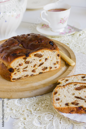 Barmbrack or bairin breac a traditional Irish fruit loaf made with sultanas and raisins often eaten buttered for afternoon tea and traditionally served at Halloween photo