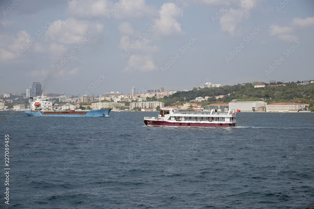 Commercial and passenger ships passing through Bosphorus, Istanbul, Turkey. 