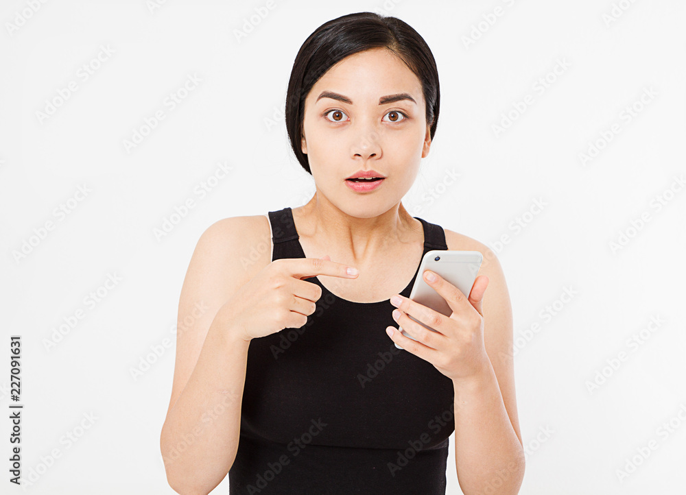 surprised, sexy asian,korean woman hold mobile phone isolated on white background, copy space surprised, sexy asian,korean woman hold mobile phone isolated on white background, copy space