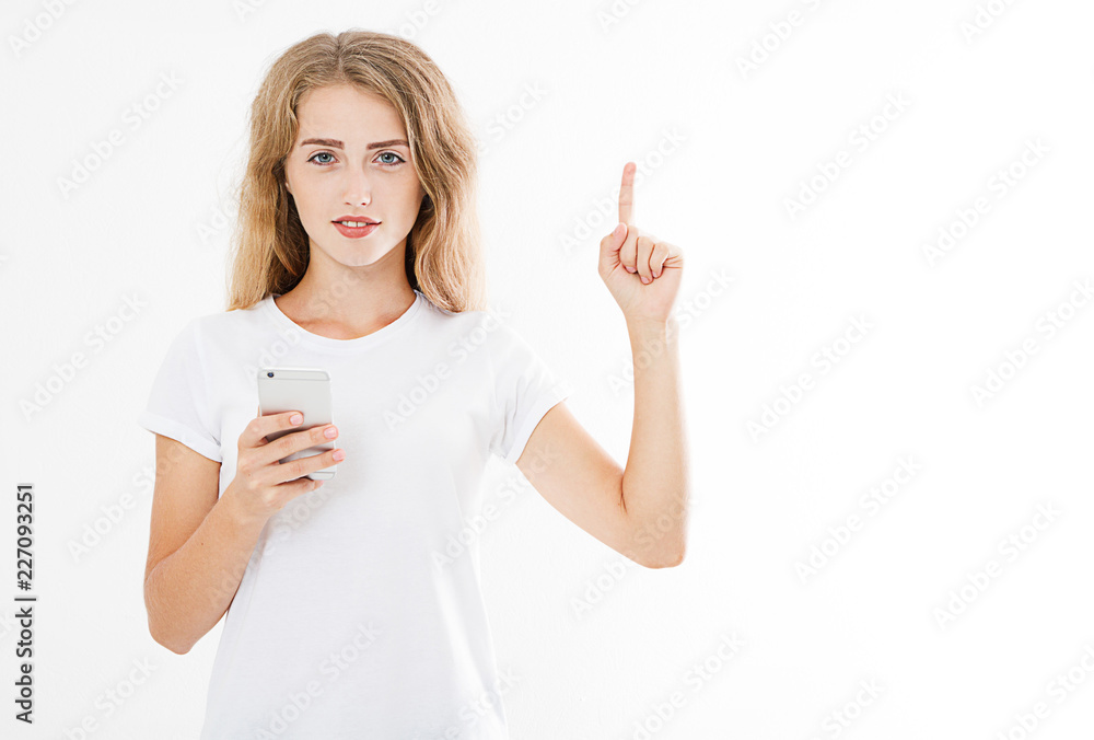 sexy woman hold cellphone pointing finger isolated on white background, hand holding black phone, copy space sexy woman hold cellphone pointing finger isolated on white background, hand holding black phone, copy space