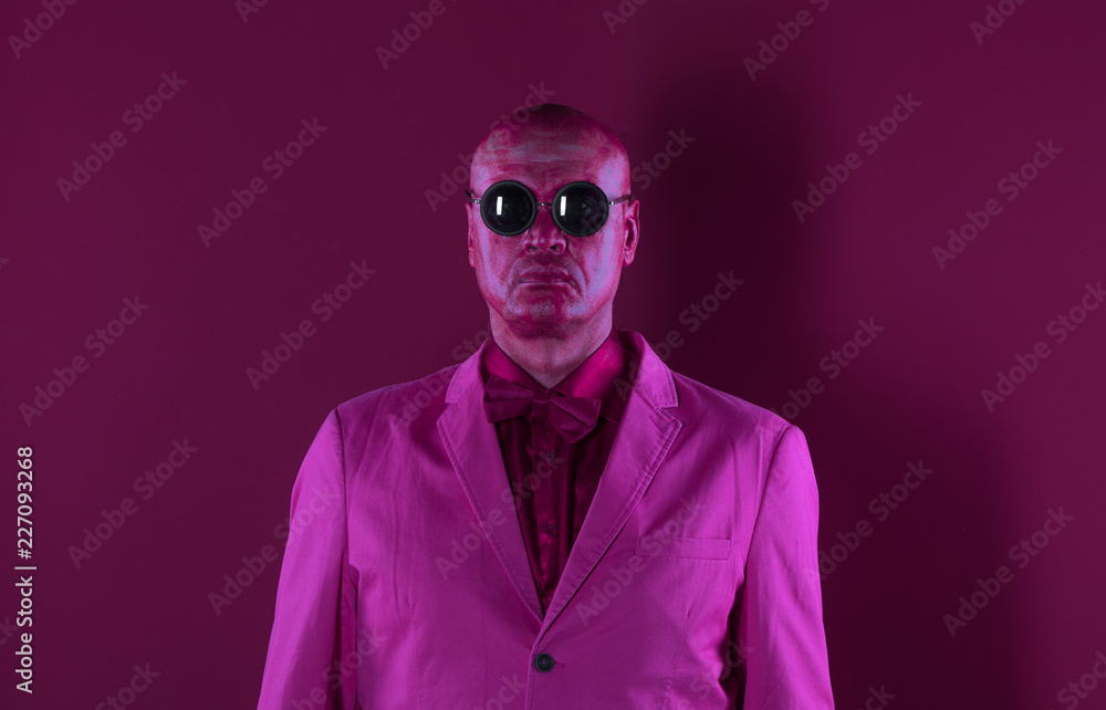 Fototapeta premium abstract portrait of a man in red paint on his face