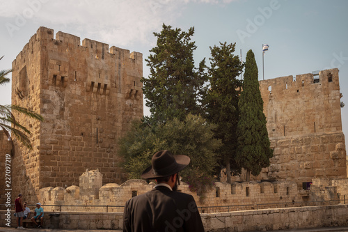 Orthodox jew in front of castle in old town Jerusalem