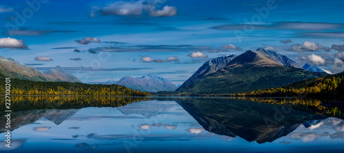 Clouds and Kenai Mountains reflected in Upper Trail Lake in Moose Pass, Alaska