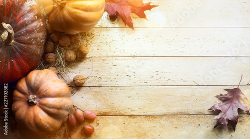 Pumpkin on wooden background; thanksgiving art