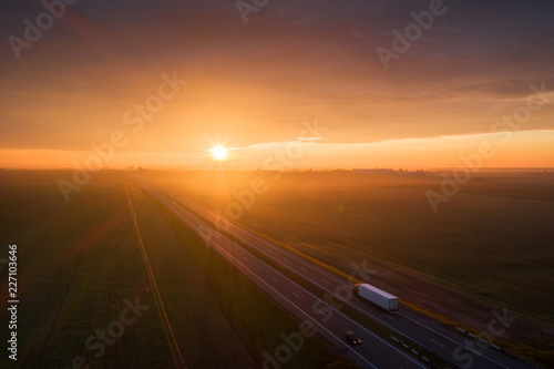 Truck on highway in the morning