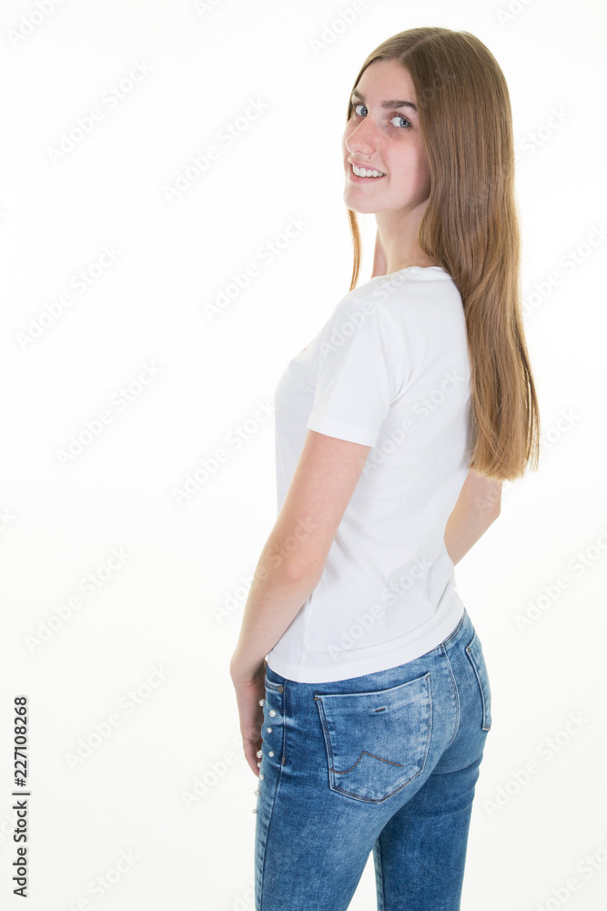 young woman casual in positive rear view beautiful girl model posing in studio over white background young woman casual in positive rear view beautiful girl model posing in studio over white background
