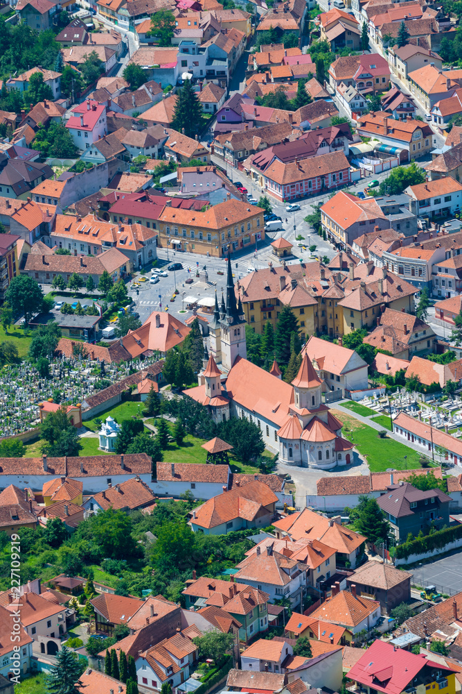 Brasov residential area with churches and a cemetery