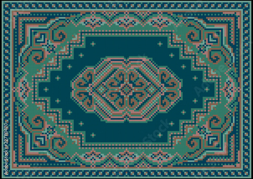 Vintage luxurious carpet in green and blue shades with a pattern on a blue field in the center