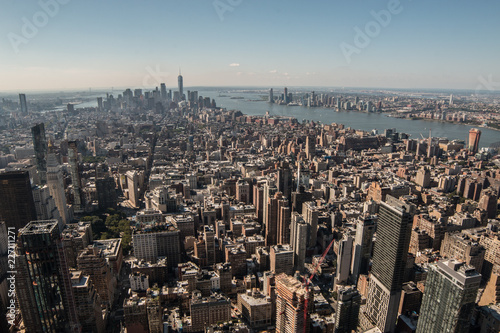 Aerial view of New York City - USA. Manhattan downtown skyline and skyscrapers from the Empire State Building in the morning.