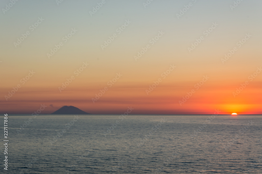 Sunset on Stromboli volcanic island view from Tropea in Calabria Italy