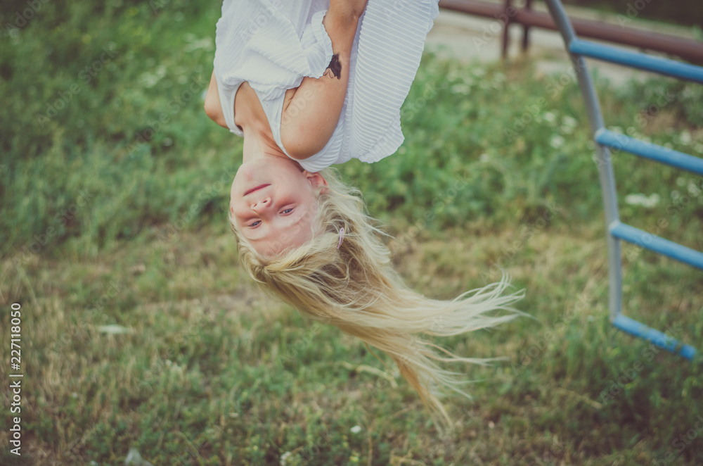 lovely girl with long hair up side down