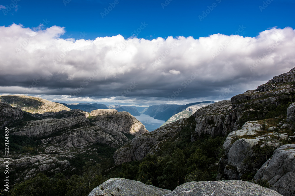 A beautiful landscape with a big mountains and fjord