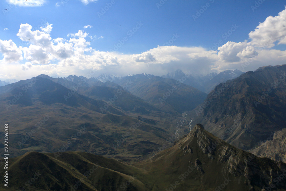 paragliding, mountain landscape with mountains and cloud paragliding, mountain landscape with mountains and cloud