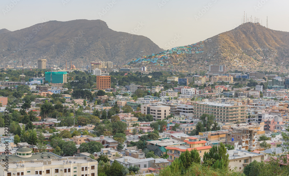 Kabul Afghanistan city scape skyline, mosque and Kabul hills mountains with houses and buildings